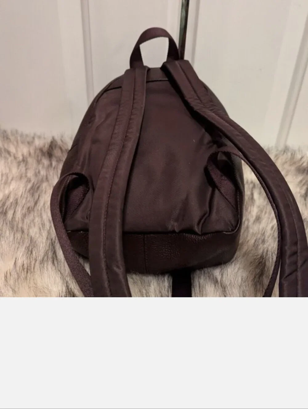 COACH F38263 CHARLIE MINI BACKPACK SHOULDER BAG IN PEBBLE LEATHER PRE-OWNED.